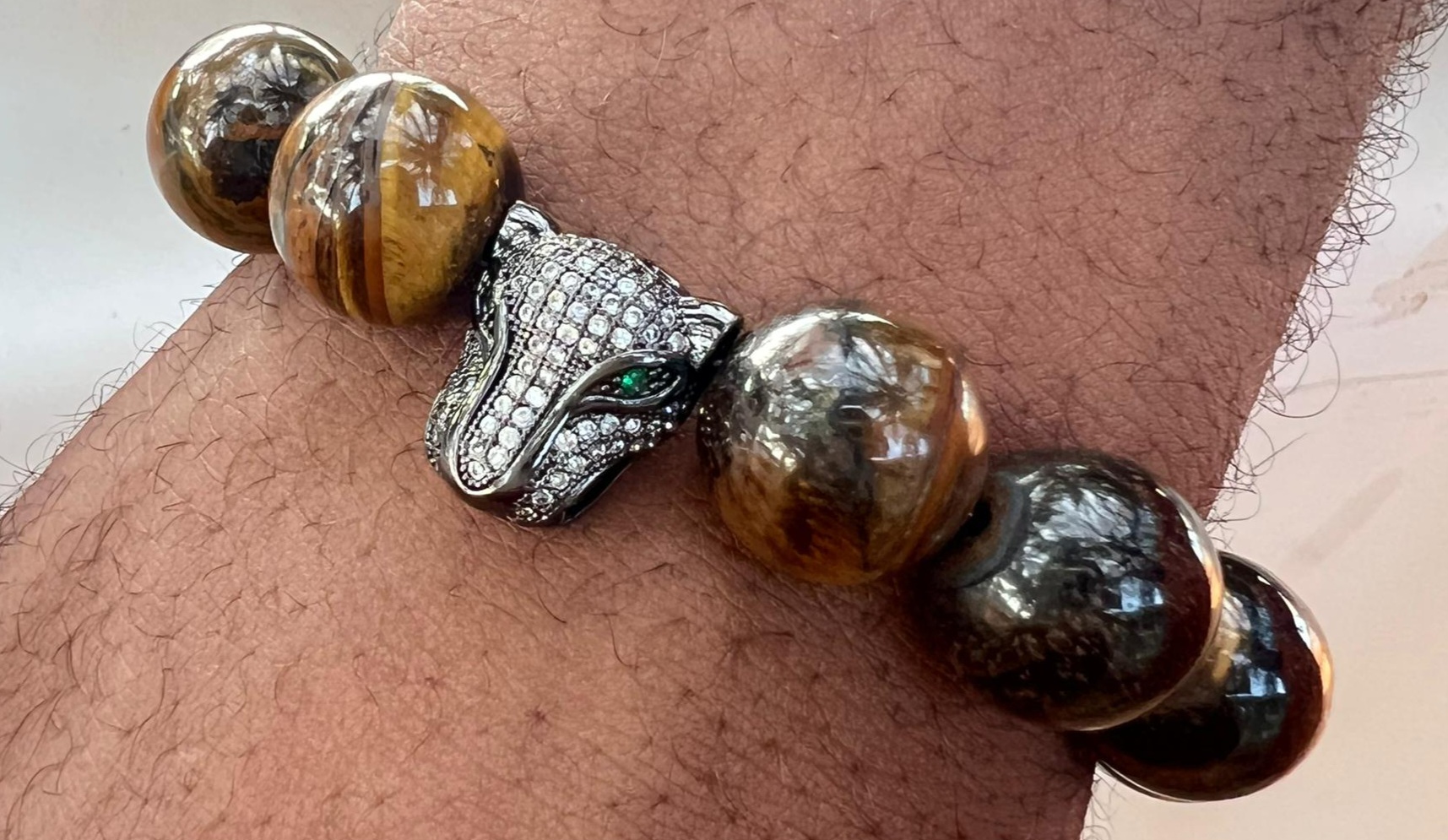 Tiger Eye stone bracelet with Black Cat Emblem by Swagger Africa — products made in Ghana on KUDUPAZAR